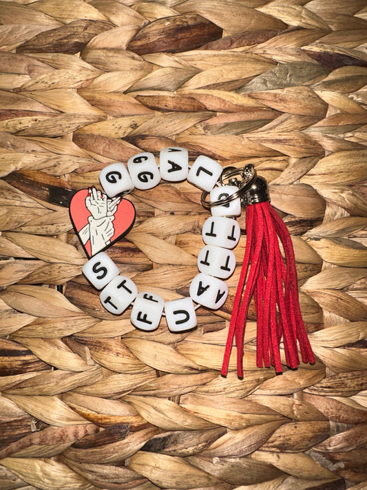 STFUATTDLAGG Wristlet